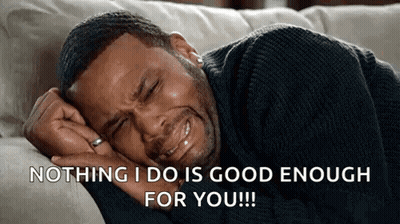 A Man Is Crying While Laying On A Couch With The Words `` Nothing I Do Is Good Enough For You '' GIF