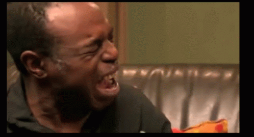 Man Crying Sitting On Couch GIF