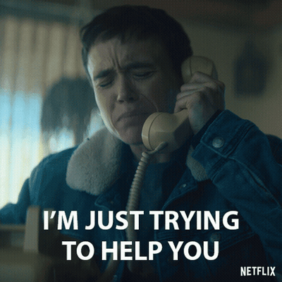 A Man Is Crying While Talking On A Telephone With The Words I 'M Just Trying To Help You Below Him GIF