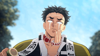 A Man Is Crying With Tears Running Down His Face . GIF