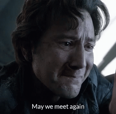A Man Is Crying With The Words `` May We Meet Again '' Written Above Him . GIF