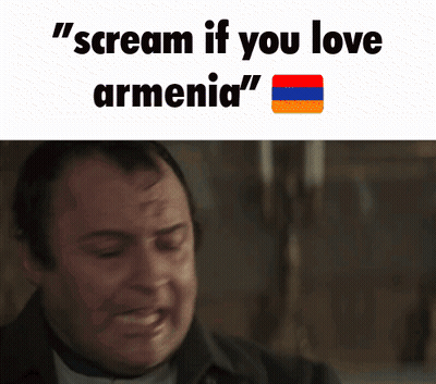 A Man Is Crying With The Words " Scream If You Love Armenia " Written Above Him GIF