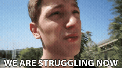 A Man Is Crying With The Words " We Are Struggling Now " Above Him GIF