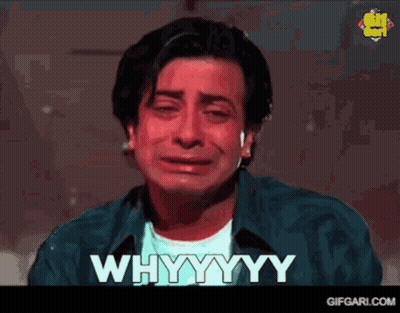 A Man Is Crying With The Words " Whyyyy " Written On The Screen GIF