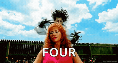 A Man Is Cutting A Woman 'S Hair And The Word Four Is On The Bottom GIF