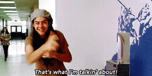 A Man Is Dancing In A Hallway And Saying `` That 'S What I 'M Talkin About ! '' GIF