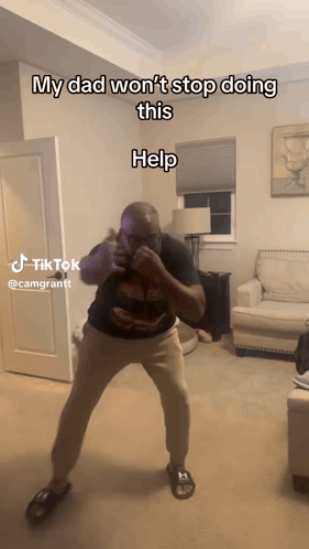 A Man Is Dancing In A Living Room With The Caption My Dad Won T Stop Doing This Help GIF