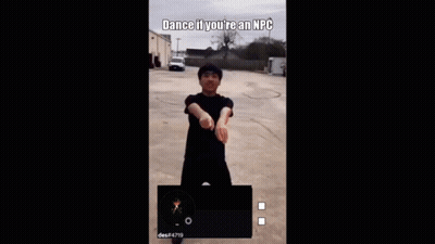 A Man Is Dancing In A Parking Lot In Front Of A Truck That Says Brandon On It . GIF