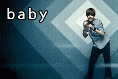 A Man Is Dancing In Front Of A Baby Sign GIF