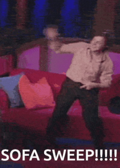 A Man Is Dancing In Front Of A Couch With The Words Sofa Sweep !!! Below Him GIF