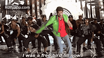 A Man Is Dancing In Front Of A Crowd Of People And Saying `` I Was A Free Bird Till Now . '' GIF