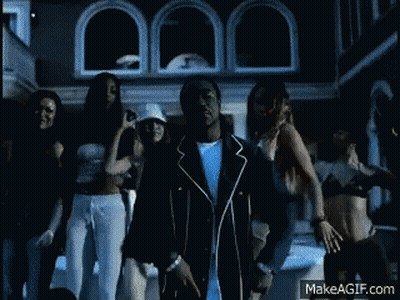 A Man Is Dancing In Front Of A Group Of Women With Makeagif.com At The Bottom Of The Image GIF