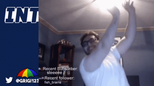 A Man Is Dancing In Front Of A Sign That Says ' Int ' On It GIF