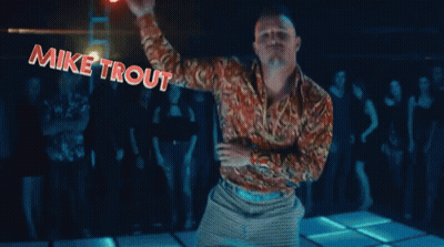 A Man Is Dancing On A Dance Floor With The Name Mike Trout Written Above Him GIF