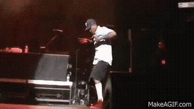 A Man Is Dancing On A Stage With Makeagif.com Written On The Bottom Of The Screen GIF