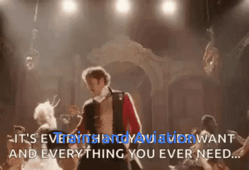 A Man Is Dancing On A Stage With The Words It 'S Everything You Ever Want And Everything You Ever Need GIF