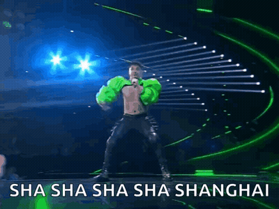 A Man Is Dancing On A Stage With The Words Sha Sha Sha Sha Shanghai GIF