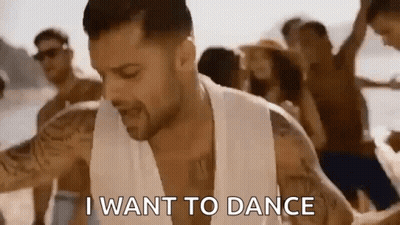 A Man Is Dancing On The Beach And Saying `` I Want To Dance '' GIF