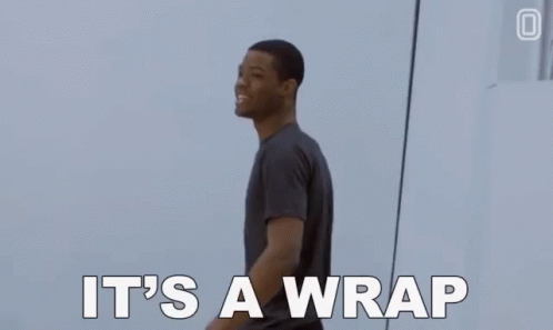 A Man Is Dancing On The Beach And Saying `` It 'S A Wrap '' . GIF