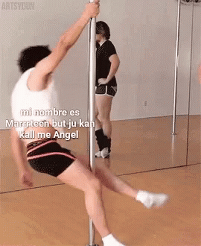 A Man Is Doing A Pole Dance In Front Of A Mirror With The Caption Mi Nombre Es Marriteen But Ju Kan Kill Me Angel GIF