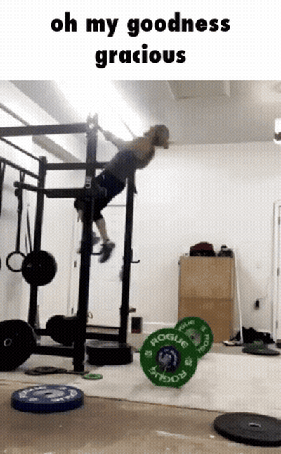 A Man Is Doing A Pull Up In A Gym With The Words Oh My Goodness Gracious On The Bottom GIF