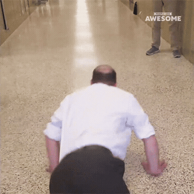 A Man Is Doing Push Ups In A Hallway With The Words Awesome On The Bottom GIF