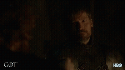 A Man Is Drinking From A Cup With The Word Got On The Bottom GIF