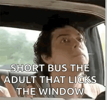 A Man Is Driving A Car And Looking Out The Window With The Words `` Short Bus The Adult That Licks The Window '' GIF