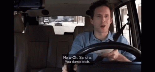 A Man Is Driving A Car And Says " No W-Oh Sandra " GIF