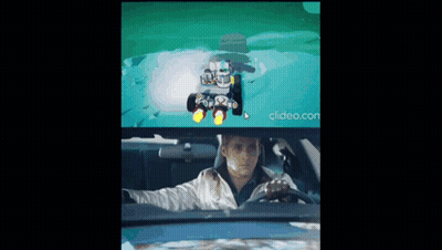 A Man Is Driving A Car With A Scuba Diver In The Rear View Mirror .. GIF