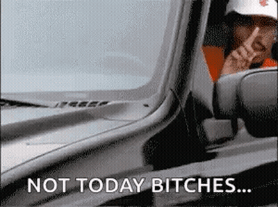 A Man Is Driving A Car With The Words Not Today Bitches Written On The Side GIF