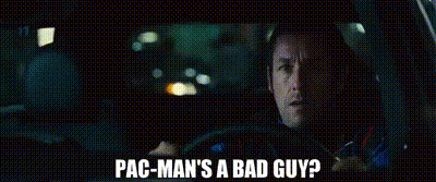 A Man Is Driving A Car With The Words `` Pac-Man 'S A Bad Guy '' Written On The Screen . GIF