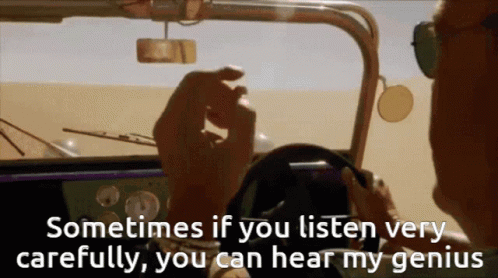 A Man Is Driving A Car With The Words " Sometimes If You Listen Very Carefully You Can Hear My Genius " GIF