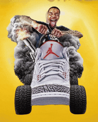 A Man Is Driving A Lawn Mower Made Out Of A Pair Of Jordan Shoes GIF