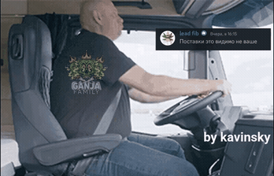 A Man Is Driving A Truck With A Ganja Family Shirt On GIF