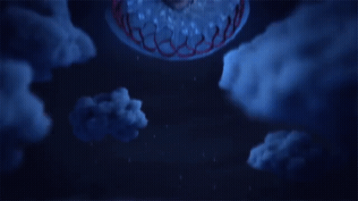 A Man Is Floating In The Air With A Cake In His Head GIF