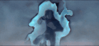 A Man Is Flying Through The Air With A Blue Light Coming Out Of His Hands GIF