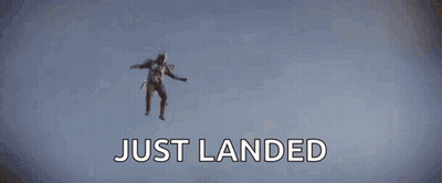A Man Is Flying Through The Air With The Words Just Landed Below Him GIF