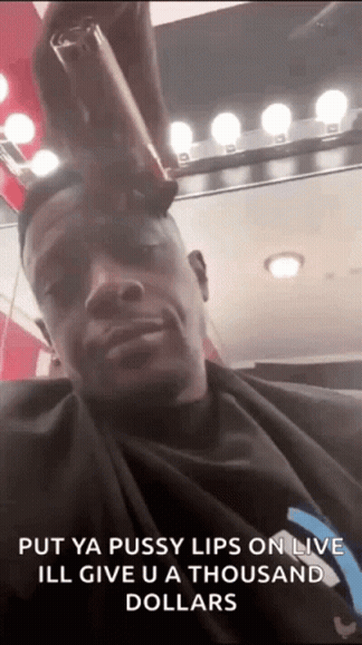 A Man Is Getting His Hair Cut At A Barber Shop And Says `` Put Ya Pussy Lips On Live '' . GIF