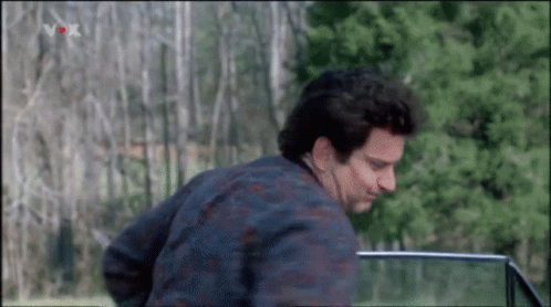 A Man Is Getting Out Of A Car With A Vox Logo On The Bottom Right GIF