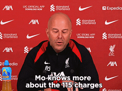 A Man Is Giving A Press Conference With The Words Mo Knows More About The 115 Charges Behind Him GIF
