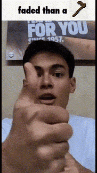 A Man Is Giving A Thumbs Up In Front Of A Poster That Says " For You " GIF