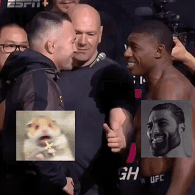 A Man Is Giving A Thumbs Up To Another Man In Front Of A Crowd . GIF