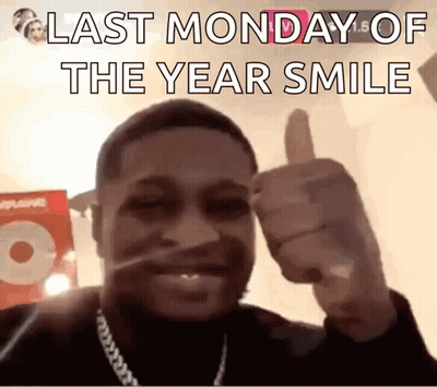 A Man Is Giving A Thumbs Up With The Words Last Monday Of The Year Smile Below Him GIF