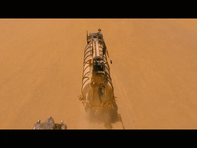 A Man Is Hanging From A Rope Next To A Vehicle GIF