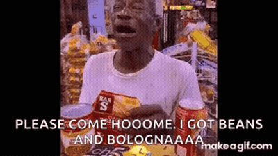 A Man Is Holding A Bag Of Beans And A Can Of Soda . GIF