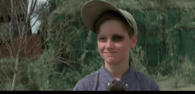 A Man Is Holding A Baseball Bat And A Boy Is Holding A Bat . GIF