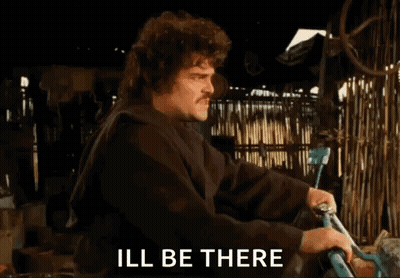 A Man Is Holding A Bicycle And Saying Ill Be There GIF