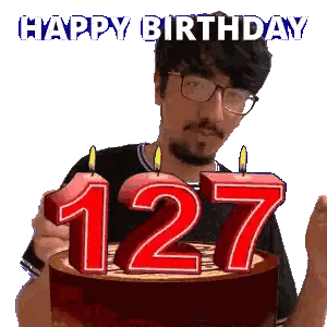 A Man Is Holding A Birthday Cake With Candles That Say 127 Sticker