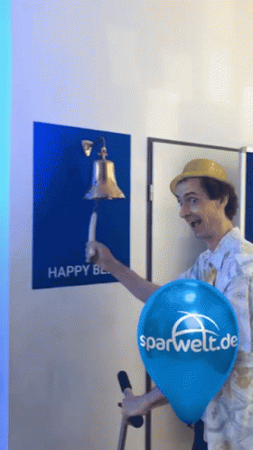 A Man Is Holding A Blue Balloon With The Word Sparwelt.de On It GIF